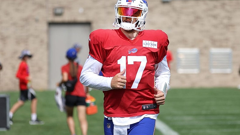 Bills quarterback Josh Allen heads to the main practice field from back field during training camp.