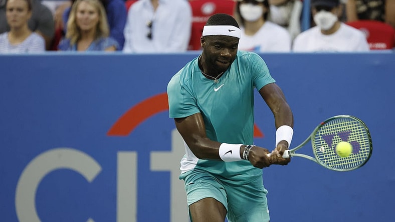 Aug 1, 2023; Washington, D.C., USA; Frances Tiafoe (USA) hits a backhand against Aslan Karatsev (not pictured) on day four of the Mubadala Citi DC Open at Fitzgerald Tennis Stadium. Mandatory Credit: Geoff Burke-USA TODAY Sports