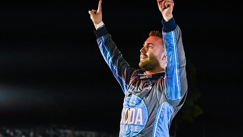 Ty Majeski (91) celebrates his victory in the Gandrud Auto Group 250 on Tuesday, August 1, 2023, at Wisconsin International Raceway in Kaukauna, Wisconsin.