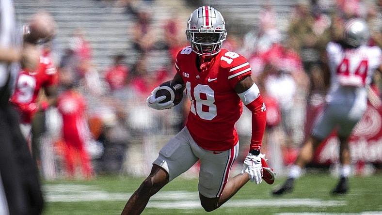 Apr 15, 2023; Columbus, Ohio, United States;  Ohio State Buckeyes wide receiver Marvin Harrison Jr. (18) sprints down the side of the field during the first quarter of the Ohio State Buckeyes spring game at Ohio Stadium on Saturday morning. Mandatory Credit: Joseph Scheller-The Columbus Dispatch
