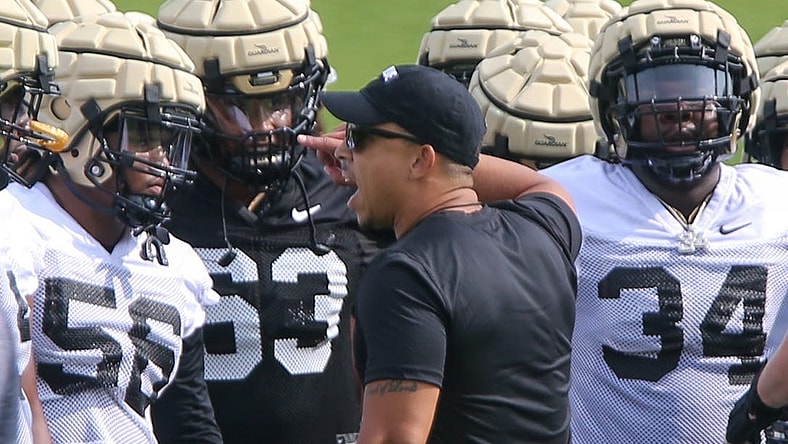 Purdue Boilermakers head coach Ryan Walters coaches players during Purdue football practice, Wednesday, August 2, 2023, at Purdue University in West Lafayette, Ind.