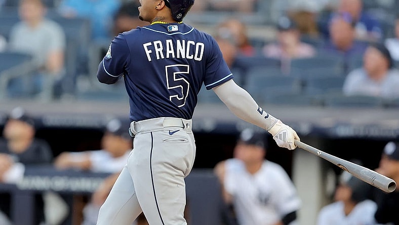 Aug 2, 2023; Bronx, New York, USA; Tampa Bay Rays shortstop Wander Franco (5) follows through on a two run home run against the New York Yankees during the first inning at Yankee Stadium. Mandatory Credit: Brad Penner-USA TODAY Sports