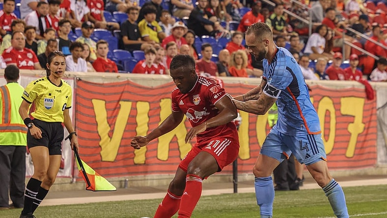 Aug 3, 2023; Harrison, NJ, USA; New York Red Bulls forward Elias Manoel (11) and New York City FC defender Maxime Chanot (4) battle for the ball during the second half at Red Bull Arena. Mandatory Credit: Ed Mulholland-USA TODAY Sports