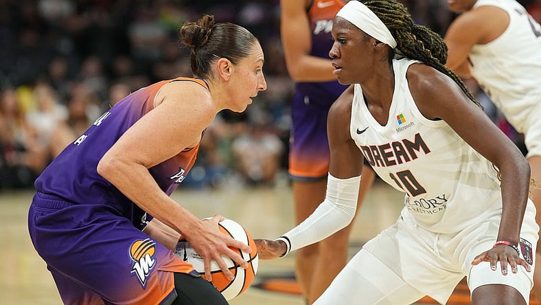 Aug 3, 2023; Phoenix, Arizona, USA; Atlanta Dream guard Rhyne Howard (10) plays defense against Phoenix Mercury guard Diana Taurasi (3) during the game at at Footprint Center. Mandatory Credit: Joe Camporeale-USA TODAY Sports