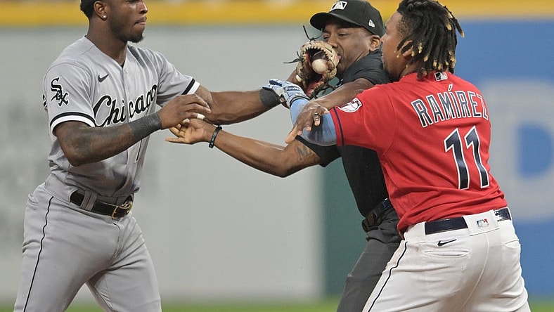 Aug 5, 2023; Cleveland, Ohio, USA; Umpire Malachi Moore tries to separate Cleveland Guardians third baseman Jose Ramirez (11) and Chicago White Sox shortstop Tim Anderson (7) after Ramirez slid into second with an RBI double during the sixth inning at Progressive Field. Mandatory Credit: Ken Blaze-USA TODAY Sports