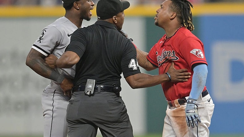 Aug 5, 2023; Cleveland, Ohio, USA; Umpire Malachi Moore tries to separate Cleveland Guardians third baseman Jose Ramirez (11) and Chicago White Sox shortstop Tim Anderson (7) after Ramirez slid into second with an RBI double during the sixth inning at Progressive Field. Mandatory Credit: Ken Blaze-USA TODAY Sports