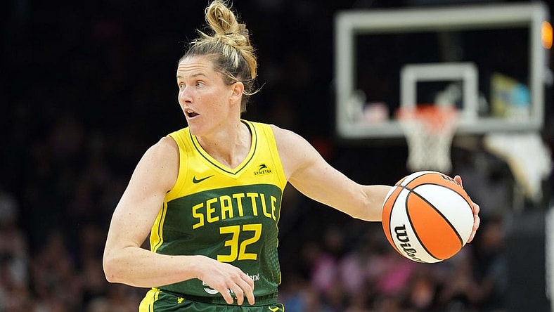 Aug 5, 2023; Phoenix, Arizona, USA; Seattle Storm guard Sami Whitcomb (32) dribbles against the Phoenix Mercury during the second half at Footprint Center. Mandatory Credit: Joe Camporeale-USA TODAY Sports