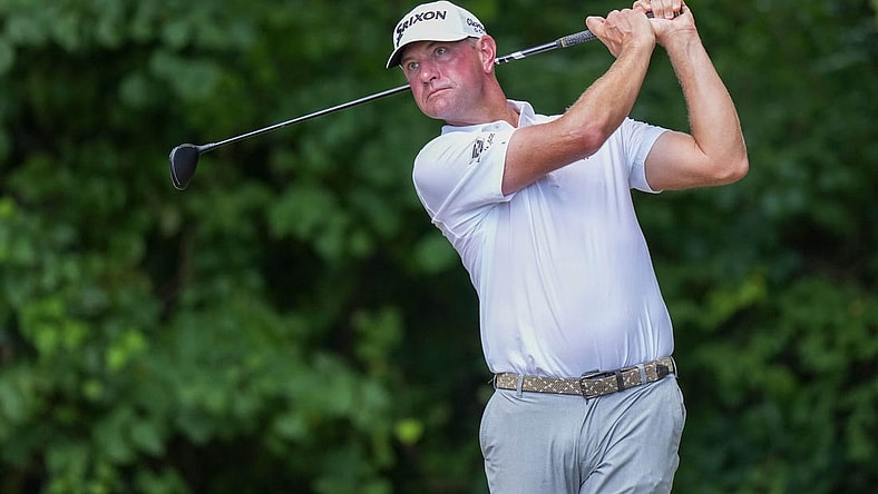 Aug 6, 2023; Greensboro, North Carolina, USA; Lucas Glover watches his shot from the 2nd tee during the final round of the Wyndham Championship golf tournament. Mandatory Credit: David Yeazell-USA TODAY Sports