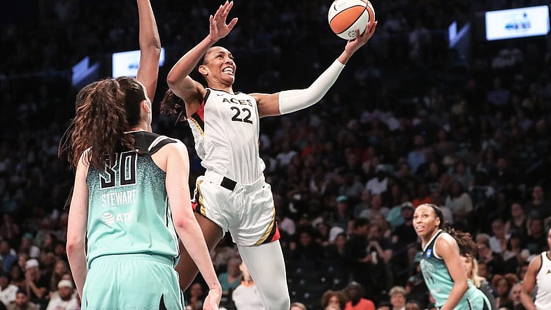 Aug 6, 2023; Brooklyn, New York, USA;  Las Vegas Aces forward A'ja Wilson (22) drives to the basket in the third quarter against the New York Liberty at Barclays Center. Mandatory Credit: Wendell Cruz-USA TODAY Sports
