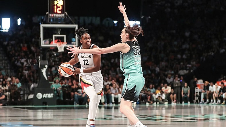Aug 6, 2023; Brooklyn, New York, USA; Las Vegas Aces guard Chelsea Gray (12) is guarded by New York Liberty forward Breanna Stewart (30) in the third quarter at Barclays Center. Mandatory Credit: Wendell Cruz-USA TODAY Sports