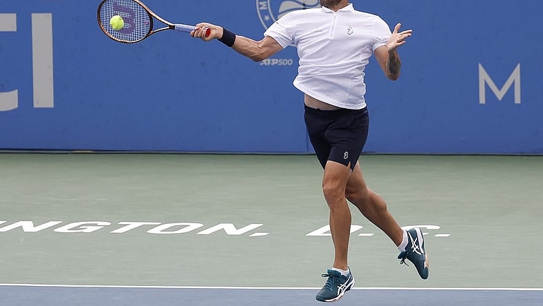 Aug 6, 2023; Washington, D.C., USA; Daniel Evans (GBR) hits a forehand against Tallon Griekspoor (NED) (not pictured) in the men's singles final on day nine of the Mubadala Citi DC Open at Fitzgerald Tennis Stadium. Mandatory Credit: Geoff Burke-USA TODAY Sports