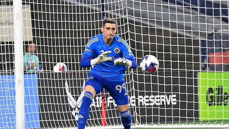 Aug 7, 2023; Foxborough, MA, USA; New England Revolution goalkeeper Djordje Petrovic (99) grabs the ball during the second half against the Queretaro FC at Gillette Stadium. Mandatory Credit: Eric Canha-USA TODAY Sports