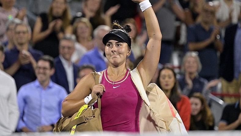 Aug 8, 2023; Montreal, Quebec, Canada; Bianca Andreescu (CAN) waves to the crowd after her defeat against Camila Giorgi (ITA) (not pictured) during first round play at IGA Stadium. Mandatory Credit: Eric Bolte-USA TODAY Sports