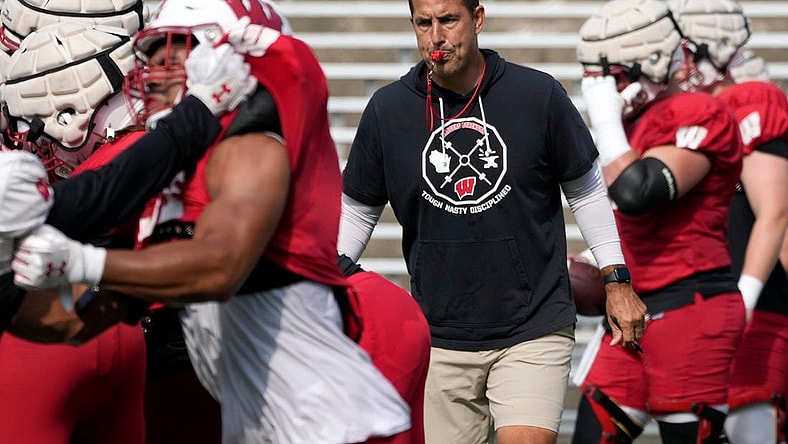 Wisconsin Badgers head coach Luke Fickell watches a drill during fall training camp at Camp Randall Stadium in Madison on Thursday, Aug. 10, 2023.