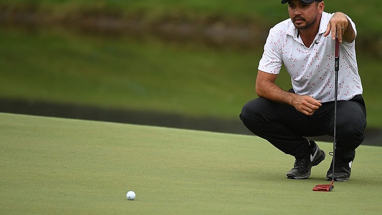 Aug 10, 2023; Memphis, Tennessee, USA; Jason Day lines up a putt on the 18th green during the first round of the FedEx St. Jude Championship golf tournament. Mandatory Credit: Christopher Hanewinckel-USA TODAY Sports