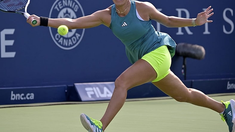 Aug 11, 2023; Montreal, Quebec, Canada; Jessica Pegula (USA) hits a forehand against Coco Gauff (USA) (not pictured) during quarterfinal play at IGA Stadium. Mandatory Credit: Eric Bolte-USA TODAY Sports
