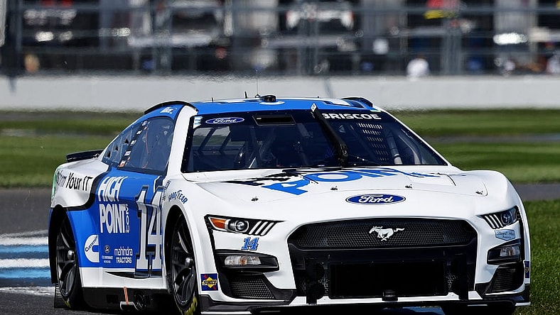 Aug 12, 2023; Speedway, Indiana, USA; NASCAR Cup Series driver Chase Briscoe (14) during qualifying for the Verizon 200 at the Brickyard at Indianapolis Motor Speedway Road Course. Mandatory Credit: Mike Dinovo-USA TODAY Sports