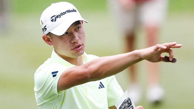 PGA Tour player Collin Morikawa points down the fairway after teeing off on the first hole during the third round of the FedEx St. Jude Championship at TPC Southwind in Memphis, Tenn., on Saturday, August 12, 2023.