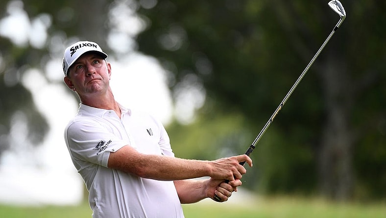 Aug 12, 2023; Memphis, Tennessee, USA; Lucas Glover hits his second shot on the ninth hole during the third round of the FedEx St. Jude Championship golf tournament. Mandatory Credit: Christopher Hanewinckel-USA TODAY Sports