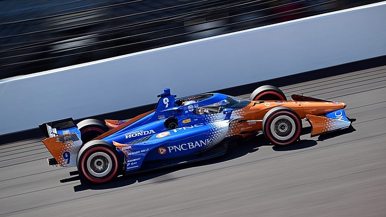 Aug 12, 2023; Speedway, Indiana, USA; Chip Ganassi Racing driver Scott Dixon (9) of New Zealand heads down the straight away during the Gallagher Grand Prix at the Indianapolis Motor Speedway Road Course. Mandatory Credit: Marc Lebryk-USA TODAY Sports