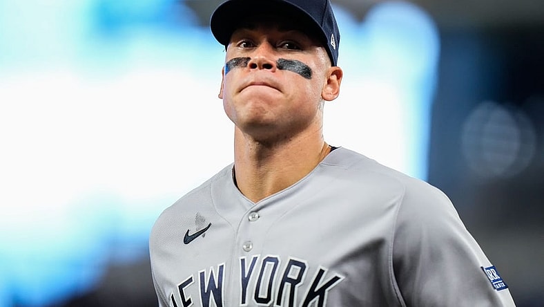 Aug 12, 2023; Miami, Florida, USA; New York Yankees right fielder Aaron Judge (99) runs back to the dug out against the Miami Marlins during the fifth inning at loanDepot Park. Mandatory Credit: Rich Storry-USA TODAY Sports