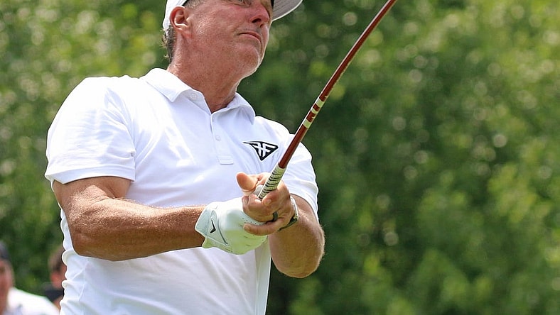 Bedminster, NJ August 12, 2023 -- Phil Mickelson at the first tee during the second round of the 2023 LIV Golf Tournament held at Trump National in Bedminster, NJ but Trump impersonator Thomas Mundy came to entertain on August 12, 2023.