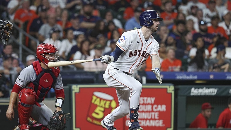 Aug 12, 2023; Houston, Texas, USA; Houston Astros right fielder Kyle Tucker (30) hits a single during the seventh inning against the Los Angeles Angels at Minute Maid Park. Mandatory Credit: Troy Taormina-USA TODAY Sports