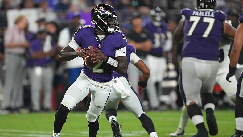 Aug 12, 2023; Baltimore, Maryland, USA; Baltimore Ravens quarterback Tyler Huntley (2) rolls out to pass in the third quarter against the Philadelphia Eagles at M&T Bank Stadium. Mandatory Credit: Mitch Stringer-USA TODAY Sports