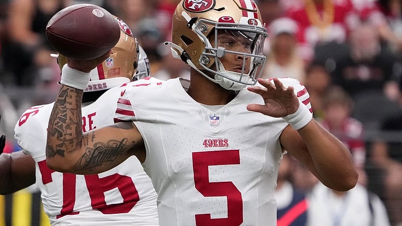 Aug 13, 2023; Paradise, Nevada, USA; San Francisco 49ers quarterback Trey Lance (5) throws the ball against the Las Vegas Raiders in the first half at Allegiant Stadium. Mandatory Credit: Kirby Lee-USA TODAY Sports