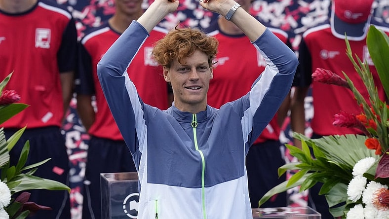Aug 13, 2023; Toronto, Ontario, Canada; Jannik Sinner (ITA) hoists the National Bank Open trophy after defeating Alex de Minaur (not pictured) in the championship game at Sobeys Stadium. Mandatory Credit: John E. Sokolowski-USA TODAY Sports