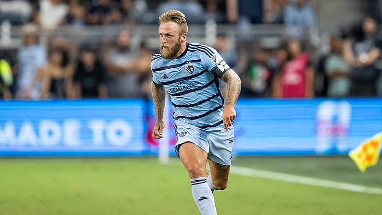 Jul 31, 2023; Kansas City, KS, USA; Sporting Kansas City forward Johnny Russell (7) controls the ball during the second half against Chivas Guadalajara at Children's Mercy Park. Mandatory Credit: Jay Biggerstaff-USA TODAY Sports