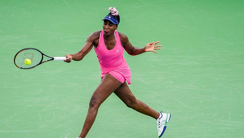 Venus Williams concentrates on her shot as she faces Veronika Kudermetova during round one of the Western & Southern Open at the Lindner Family Tennis Center in Mason Monday, August, 14, 2023.