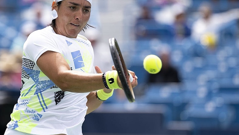 Aug 15, 2023; Mason, OH, USA; Ons Jabeur, of Tunisia, returns to Angelina Kalinina, of Ukraine, during the Western & Southern Open at Lindner Family Tennis Center. Mandatory Credit: Albert Cesare-USA TODAY Sports