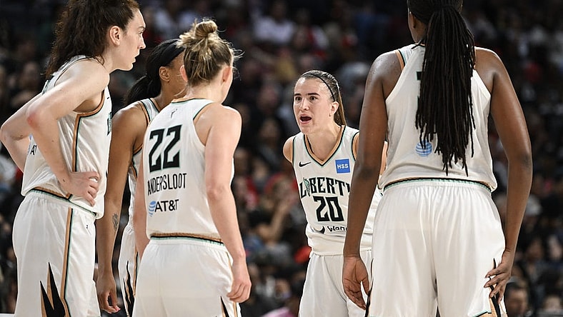 Aug 15, 2023; Las Vegas, Nevada, USA; New York Liberty guard Sabrina Ionescu (20) speaks to teammates during a timeout against the Las Vegas Aces during the fourth quarter at Michelob Ultra Arena. Mandatory Credit: Candice Ward-USA TODAY Sports