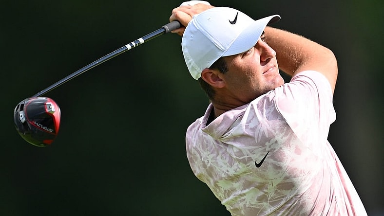 Aug 17, 2023; Olympia Fields, Illinois, USA; Scottie Scheffler tees off from the 7th tee during the first round of the BMW Championship golf tournament. Mandatory Credit: Jamie Sabau-USA TODAY Sports