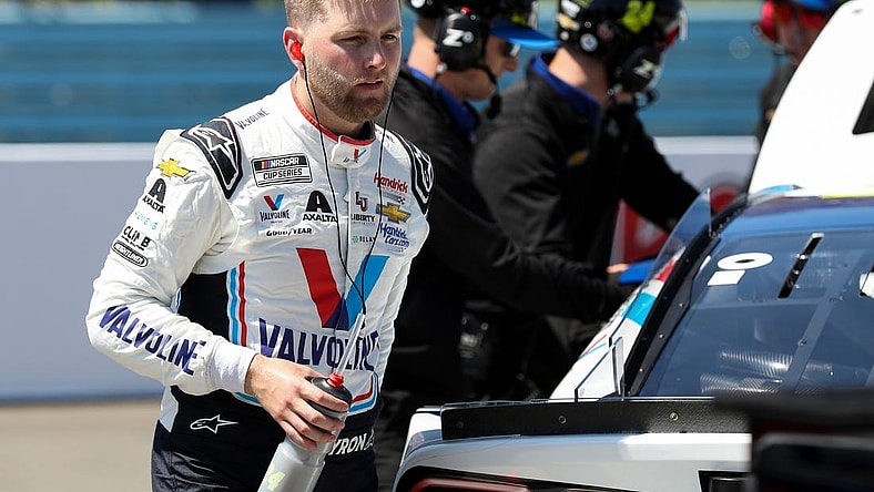 Aug 19, 2023; Watkins Glen, New York, USA; NASCAR Cup Series driver William Byron exits his race car during practice and qualifying for the Go Bowling at The Glen at Watkins Glen International. Mandatory Credit: Matthew O'Haren-USA TODAY Sports