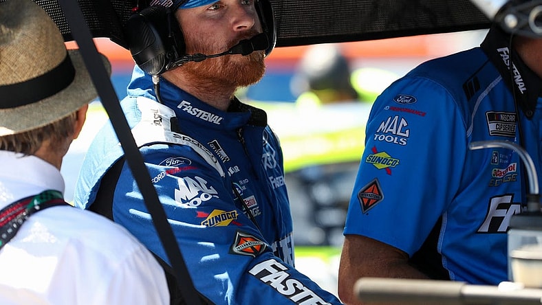 Aug 19, 2023; Watkins Glen, New York, USA; NASCAR Cup Series driver Chris Buescher looks at data during practice and qualifying for the Go Bowling at The Glen at Watkins Glen International. Mandatory Credit: Matthew O'Haren-USA TODAY Sports