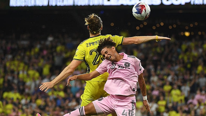 Aug 19, 2023; Nashville, TN, USA; Inter Miami midfielder David Ruiz (41) and Nashville SC defender Walker Zimmerman (25) head the ball during the second half for the Leagues Cup Championship match at GEODIS Park. Mandatory Credit: Christopher Hanewinckel-USA TODAY Sports