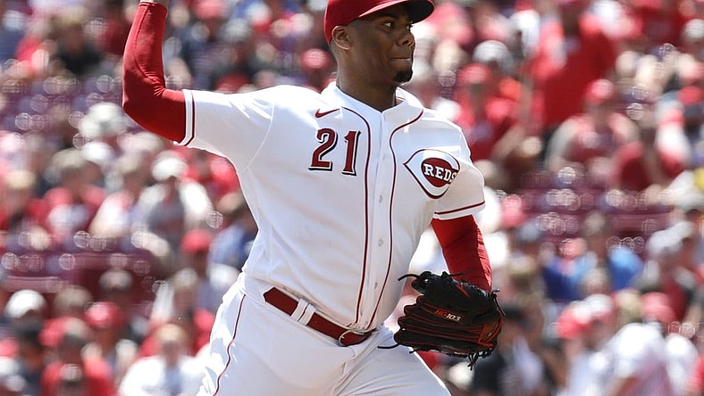 Aug 20, 2023; Cincinnati, Ohio, USA; Cincinnati Reds starting pitcher Hunter Greene (21) throws against the Toronto Blue Jays during the first inning at Great American Ball Park. Mandatory Credit: David Kohl-USA TODAY Sports