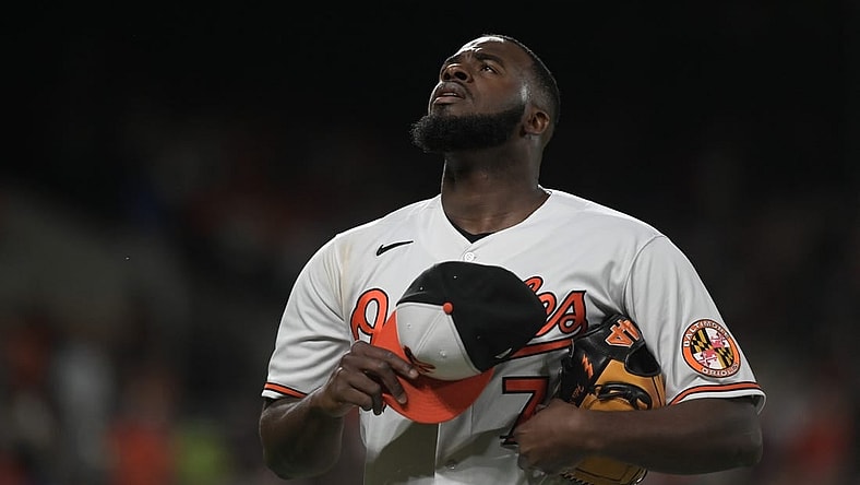 Aug 22, 2023; Baltimore, Maryland, USA; Baltimore Orioles relief pitcher Felix Bautista (74) walks off the field after pitching the ninth inning against the Toronto Blue Jays  at Oriole Park at Camden Yards. Mandatory Credit: Tommy Gilligan-USA TODAY Sports