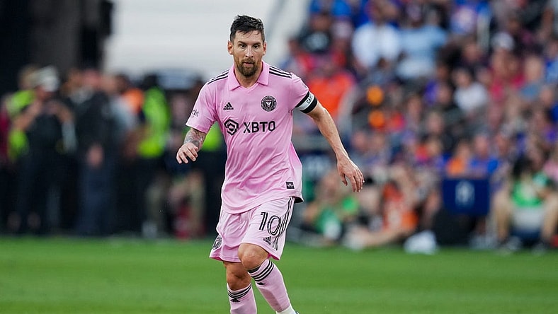 Aug 23, 2023; Cincinnati, OH, USA; Inter Miami CF forward Lionel Messi (10) dribbles the ball against FC Cincinnati during the first half at TQL Stadium. Mandatory Credit: Aaron Doster-USA TODAY Sports