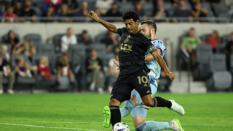 Aug 23, 2023; Los Angeles, California, USA;  Los Angeles FC forward Carlos Vela (10) scores a goal during the first half against the Colorado Rapids at BMO Stadium. Mandatory Credit: Kiyoshi Mio-USA TODAY Sports