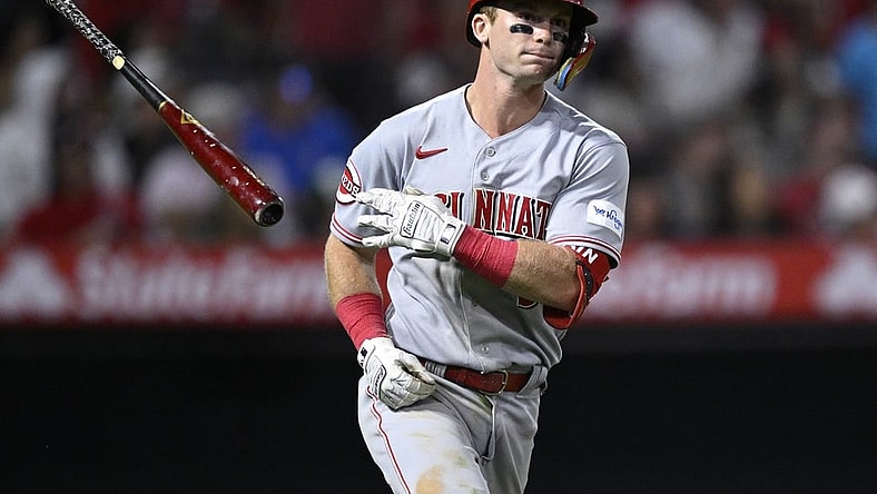 Aug 23, 2023; Anaheim, California, USA; Cincinnati Reds second baseman Matt McLain (9) tosses his bat after hitting a two-run home run against the Los Angeles Angels during the eighth inning at Angel Stadium. Mandatory Credit: Orlando Ramirez-USA TODAY Sports