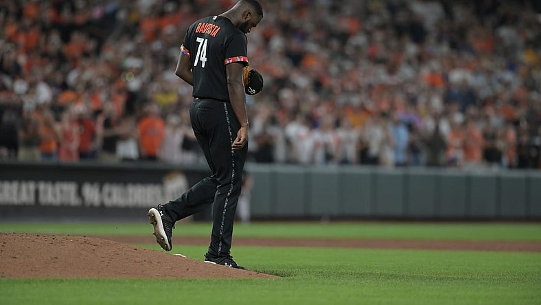 Aug 25, 2023; Baltimore, Maryland, USA; Baltimore Orioles relief pitcher Felix Bautista (74) walks off the pitcher's mound after slipping while throwing a ninth inning pitch against the Colorado Rockies at Oriole Park at Camden Yards. Mandatory Credit: Tommy Gilligan-USA TODAY Sports