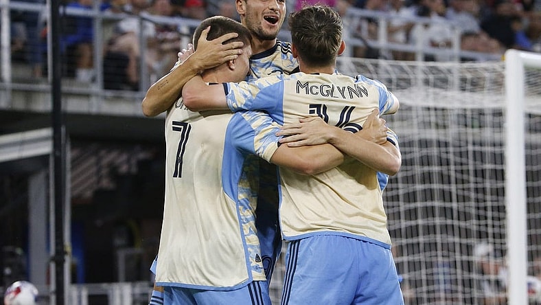 Aug 26, 2023; Washington, District of Columbia, USA; Philadelphia Union forward Mikael Uhre (7) celebrates with teammates after scoring a goal past D.C. United goalkeeper Tyler Miller (not pictured) during the first half at Audi Field. Mandatory Credit: Amber Searls-USA TODAY Sports