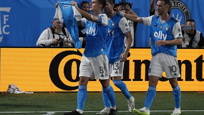 Aug 26, 2023; Charlotte, North Carolina, USA; Charlotte FC midfielder Ashley Westwood (8) celebrated goal in the first half against the Los Angeles FC at Bank of America Stadium. Mandatory Credit: Jim Dedmon-USA TODAY Sports