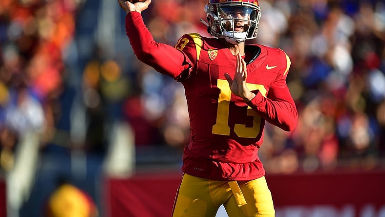 Aug 26, 2023; Los Angeles, California, USA; Southern California Trojans quarterback Caleb Williams (13) throws against the San Jose State Spartans during the first half at Los Angeles Memorial Coliseum. Mandatory Credit: Gary A. Vasquez-USA TODAY Sports