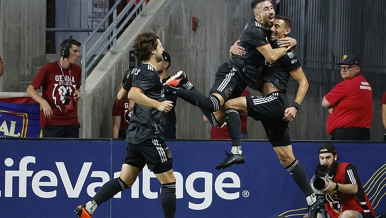 Aug 26, 2023; Sandy, Utah, USA; Houston Dynamo defender Daniel Steres (5), right, is congratulated by midfielder Artur (6) after his first half goal at America First Field. Mandatory Credit: Jeff Swinger-USA TODAY Sports