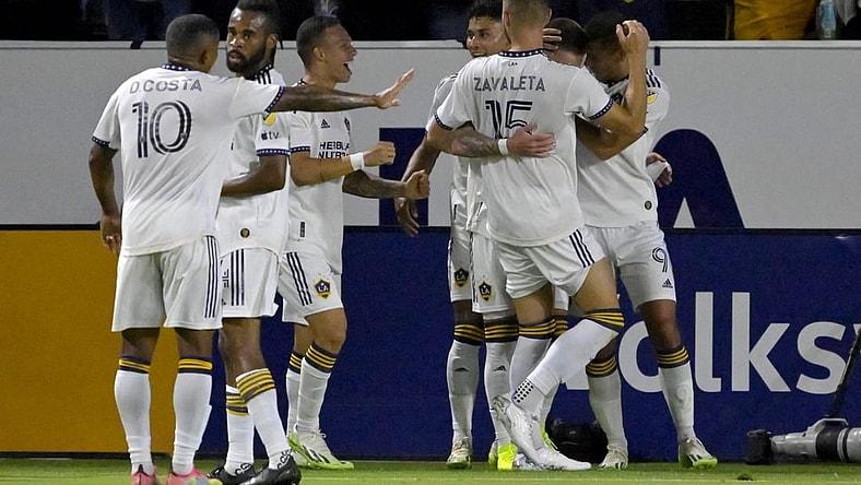 Aug 26, 2023; Carson, California, USA;  Los Angeles Galaxy players celebrate after a goal by midfielder Tyler Boyd (11) in the first half against the Chicago Fire at Dignity Health Sports Park. Mandatory Credit: Jayne Kamin-Oncea-USA TODAY Sports