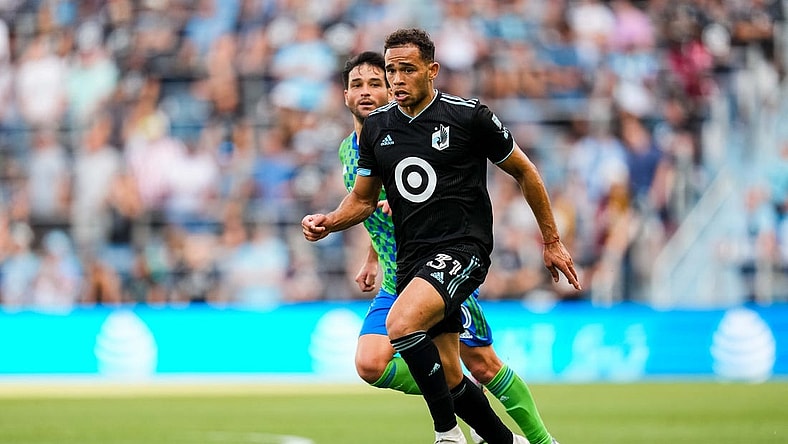 Aug 27, 2023; Saint Paul, Minnesota, USA; Minnesota United midfielder Hassani Dotson (31) dribbles during the second half against Seattle Sounders at Allianz Field. Mandatory Credit: Brace Hemmelgarn-USA TODAY Sports